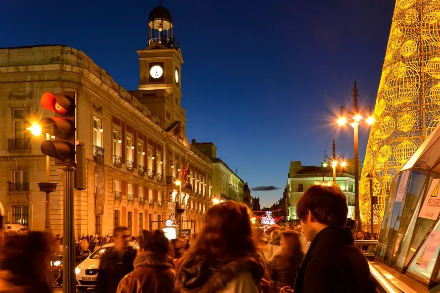 Madrid, Spain-December 8, 2014: New-Year's tree and "House of the Post Office" on square "Puerta del Sol" in Madrid